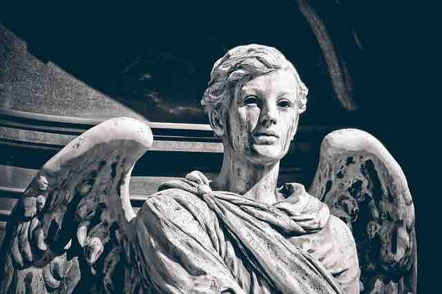A crying angel statue depicting death and misery.