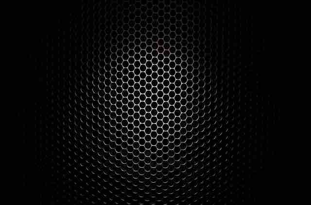 Microphone in the dark depicting desire to vent out depressed feelings and the suffocation inside.