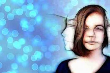A photo of a woman with two faces, one smiling and other sad, depicting Bipolar Affective Disorder