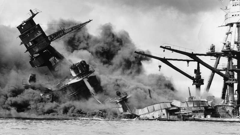 A US battleship sinking after The Pearl Harbor attack.